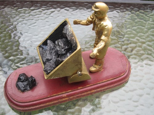Vintage brass miner - vintage, pushing