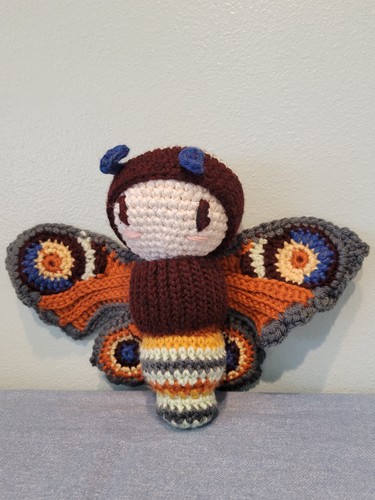Crocheted colorful peacock - colorful,