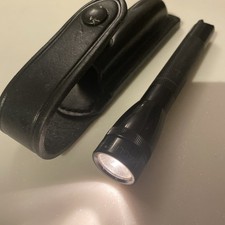 Genuine Mini Mag-lite With Belt Holder.