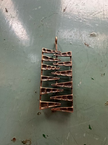 Sarpaneva bronze pendant