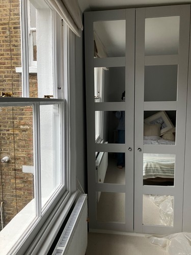 White mirrored doors wardrobe