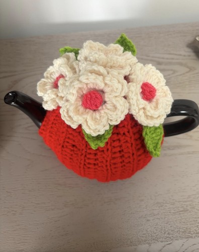 Knitted tea cosy with - knitted, crochet