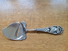 Vintage SPUR RUSTFRI cheese slicer, PAT 64416, stamped TINN Vicking ship handle