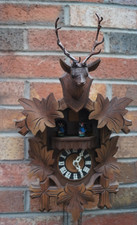 Vintage .Three weight Cuckoo clock with stags head. SEE VIDEO.