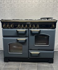 RANGEMASTER  CLASSIC DELUXE 110cm DUAL FUEL RANGE COOKER IN ANTHRACITE AND GOLD.