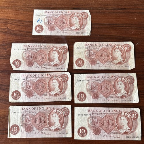 Ten shilling bank notes - ten,