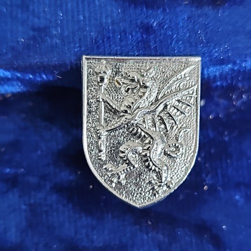 Obsolete police collar badge