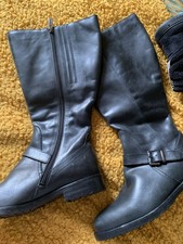 Knee high leather boots Size 4