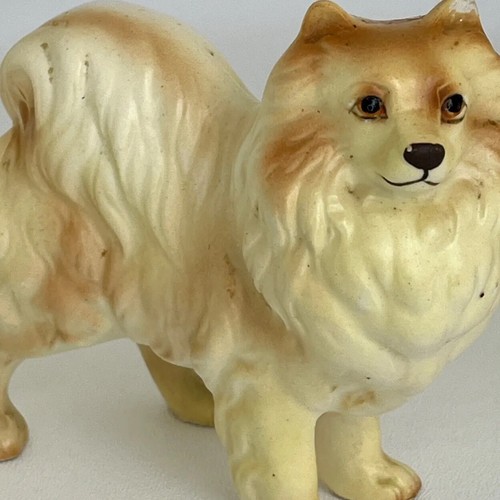 Pomeranian figurine porcelain - figurine,