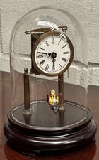 Novelty Girl On Swing Clock Under Dome