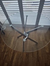 Round glass dining table seats