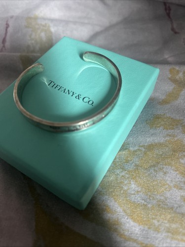Tiffany and bangle - and, co