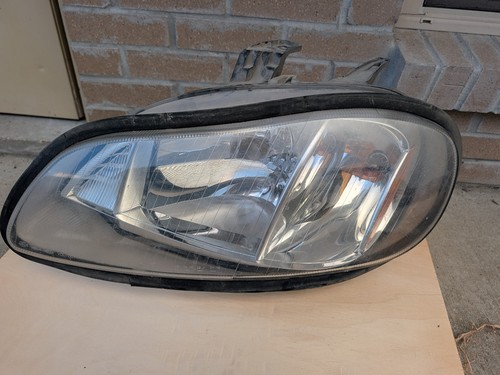 Oem left driver headlight - left,