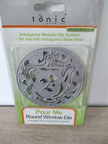 Tonic studios round window - tonic, studios,