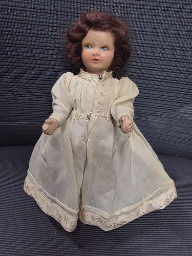 Small vintage composition doll