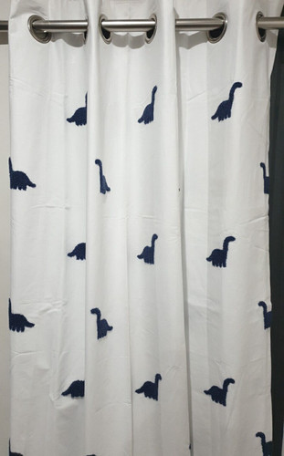 Next blue tufted dinosaur - next,