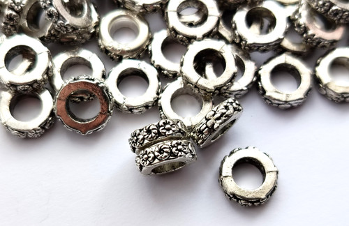 Tibetan silver flower - 50,