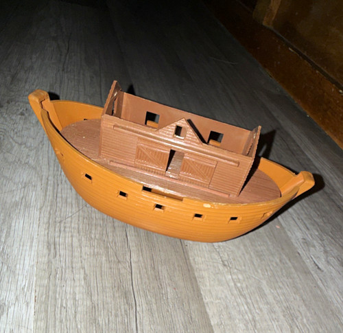 Brown plastic boat model - brown,
