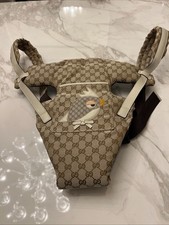 Limited edition authentic Gucci baby carrier, barely used. Exceptional condition