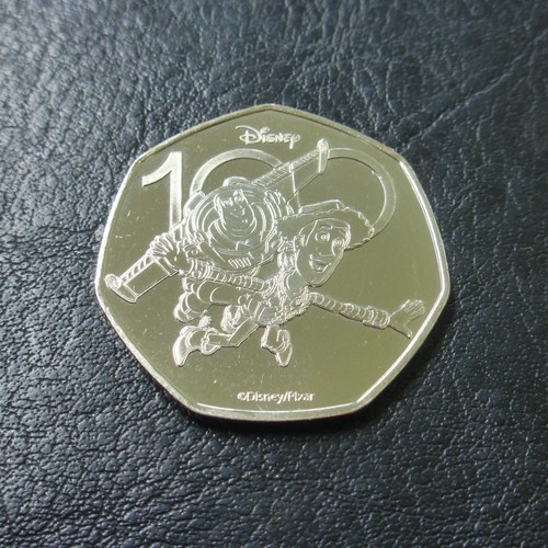 Disney woody buzz 50p coin - 50p,