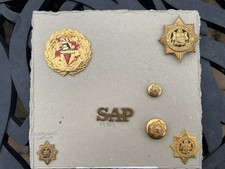 Scarce South African Police force cap badges, collar badges & buttons