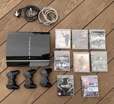 PlayStation 3 Gaming Console 80GB Piano Black, Working, 3 Controllers, 8 Games +