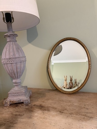 Gilt decorative oval wall