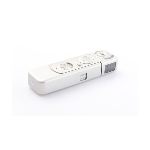 Minox with - b,