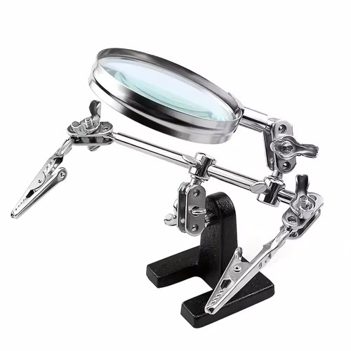Third hand magnifying glass - hand,