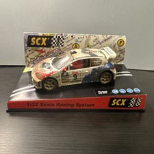 SCX 60510 - 1:32 Slot Car - Peugeot 206 WRC - Dirt Effect - 4 Wheel Drive