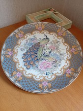 Collectable PLATE IN A PEACOCK DESIGN. VGC. Diameter 25cm.