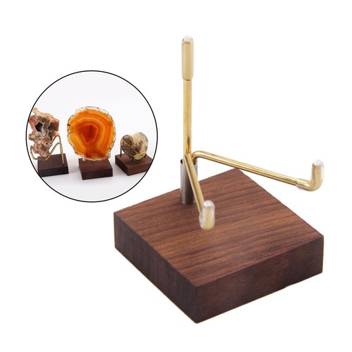 Brass arm wooden base display - wooden,