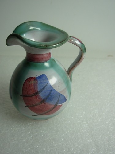 Small pottery jug with - small,