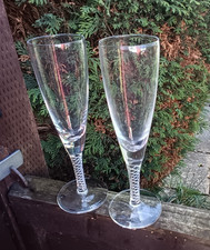 Pair of Crystal champagne glasses flutes with air twisted stems signed