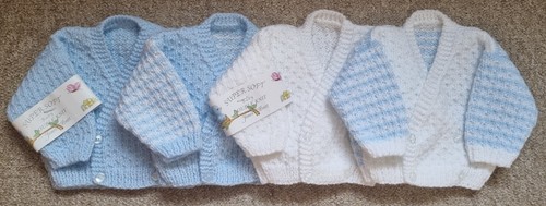 Hand knitted newborn baby - hand,
