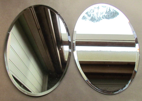 Pair large oval bevelled - of,