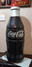 Tall coca cola bottle shaped