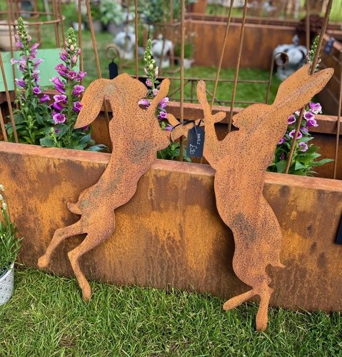 Boxing hares rusty garden - rusty,