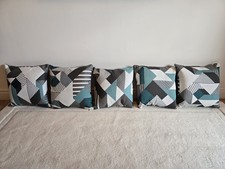 5 Cushions from Charcoal French Connection Zinc Sofas.