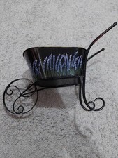 black metal wheelbarrow