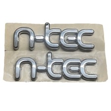 Genuine Nissan Part. 9994023301. N-TEC Badges Chrome Decals Pair Of. Nissan.