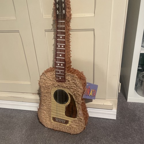 Guitar shaped piñata - to, fill