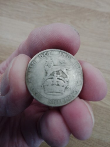 Five silver shillings - five, of
