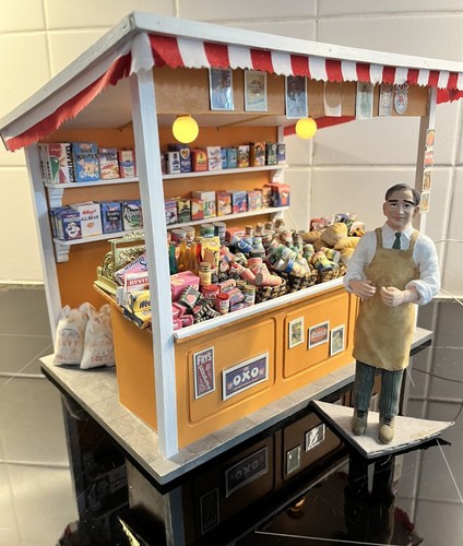 Dolls house lit market - house,