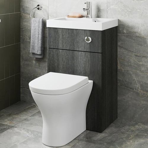 Back wall btw toilet - back,