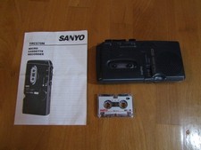 Vintage Sanyo Micro Cassette Recorder with a 30 Min Cassette. Spares or Repair