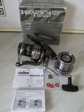 DAIWA WINDCAST-X 5000 BIG PIT REEL +  S/SPOOLS IN BOX IN GREAT USED CONDITION.