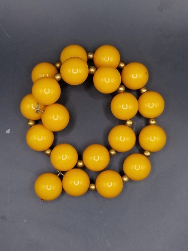 Vtg yellow bakelite stretch - yellow,