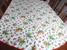Large oval Christmas tablecloth -  67 x 64 inches.