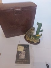 Elf owl with saguaro and